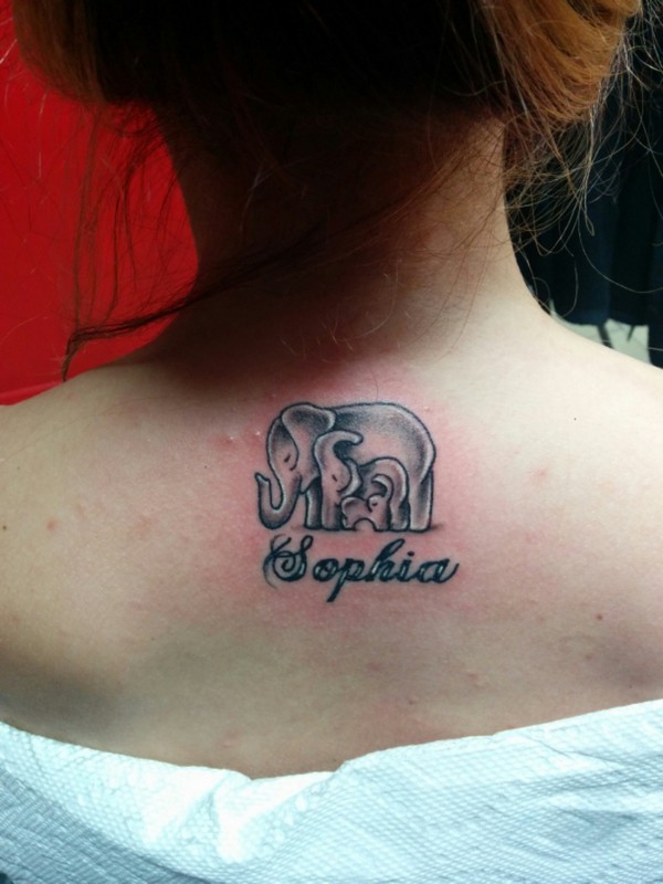 Sophia - Black Ink Elephant Family Tattoo On Girl Upper Back