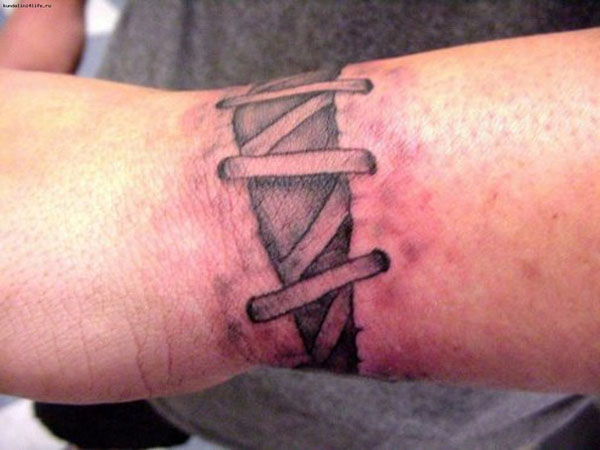Stitches Tattoo On Wrist For Men