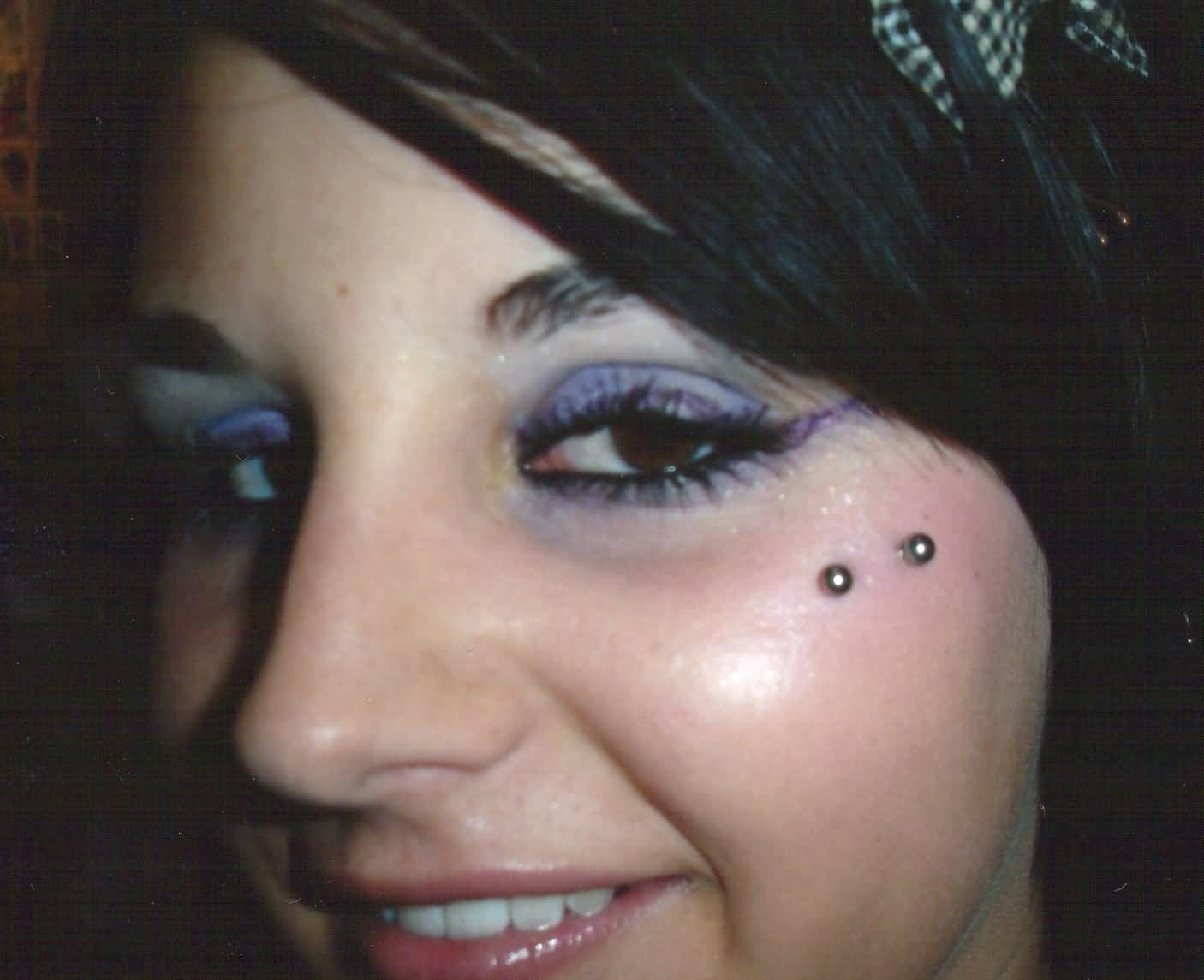 Surface Piercing On Girl Face By Clinton Osborne Of Eternal Body Piercing In Shepparton Australia