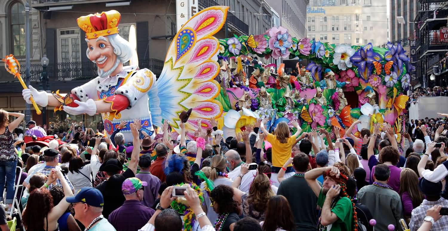 The People Of New Orleans Taking Part In Mardi Gras Parade
