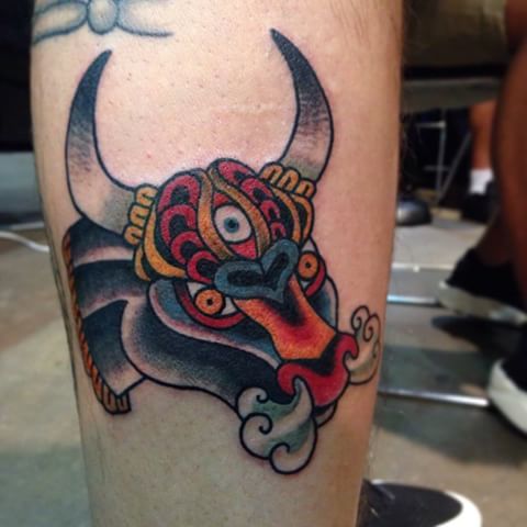 Three Eyed Traditional Bull Tattoo On Leg