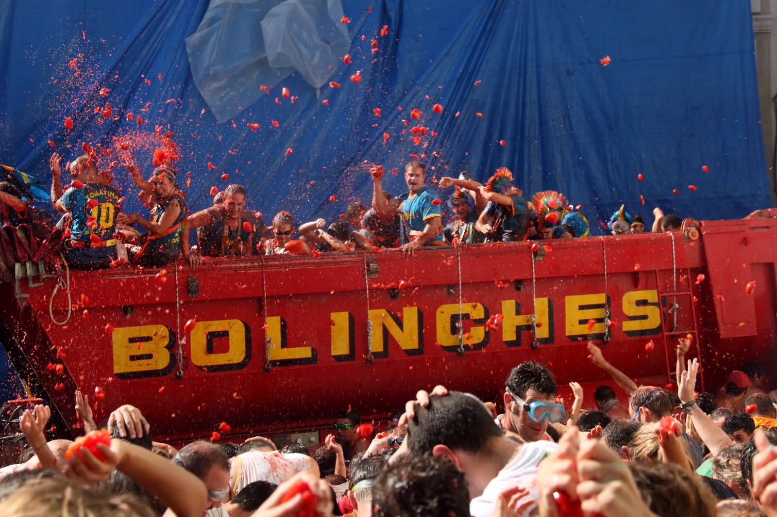 Throwing Tomatoes From Truck During La Tomatina Festival