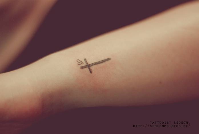 Tiny Heart And Cross Tattoo On Side Wrist