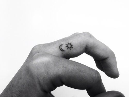 Tiny Sun And Moon Tattoos On Side Finger