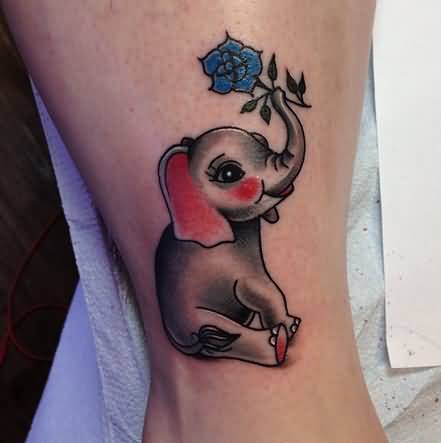 Traditional Baby Elephant With Rose Tattoo Tattoo Design
