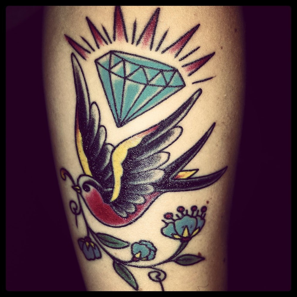 Traditional Diamond And Swallow Tattoo