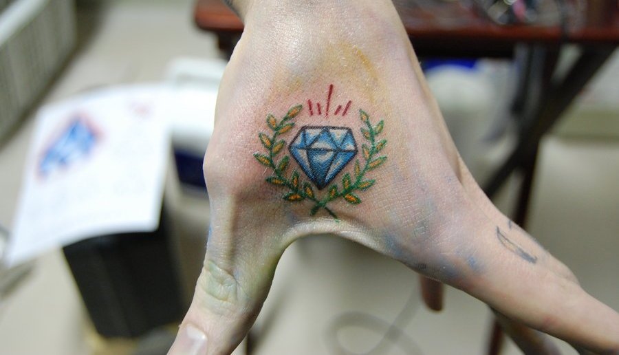 Traditional Diamond Tattoo On Left Hand