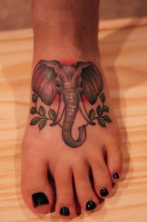 Traditional Elephant Head Tattoo On Girl Left Foot