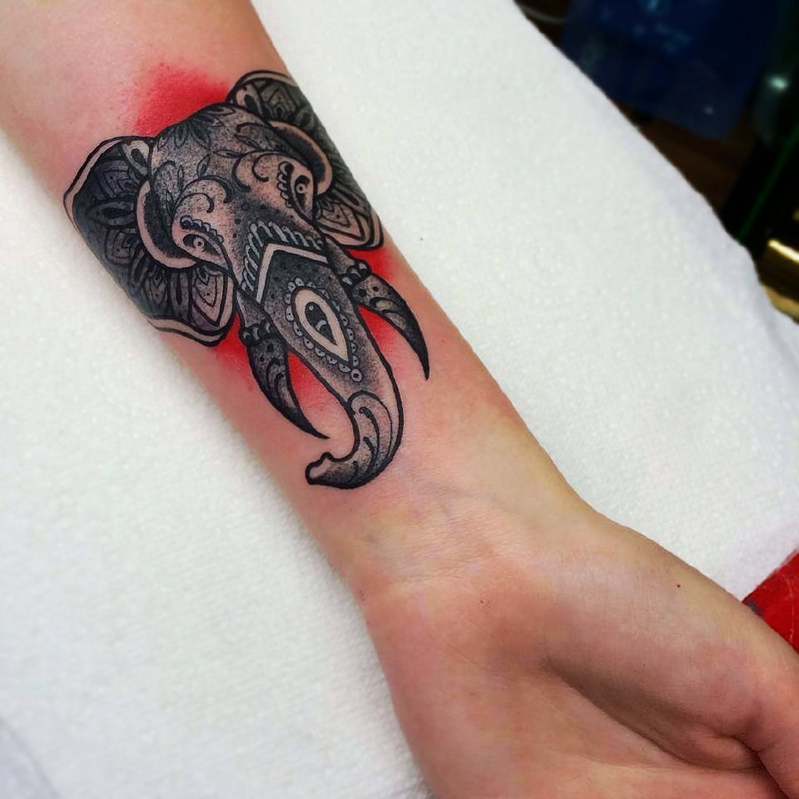Traditional Elephant Head Tattoo On Left Wrist