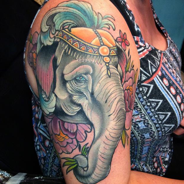 Traditional Elephant Head With Flowers Tattoo On Girl Right Half Sleeve By Bobby Ellis