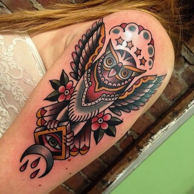 Traditional Owl With Triangle Eye And Flower Tattoo On Girl Left Half Sleeve