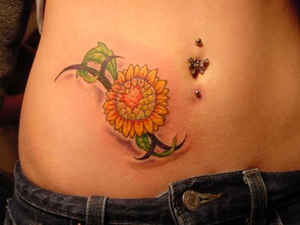 Tribal And Realistic Sunflower Tattoo On Right Hip
