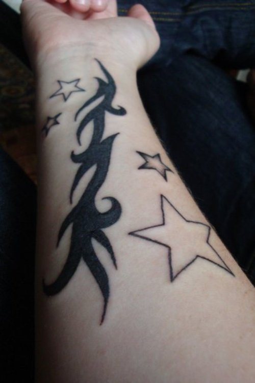 Tribal And Star Tattoos On Wrist