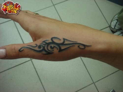 Tribal Tattoo On Right Side Hand