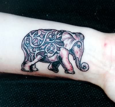 Unique Black And Grey Elephant Tattoo On Left Wrist