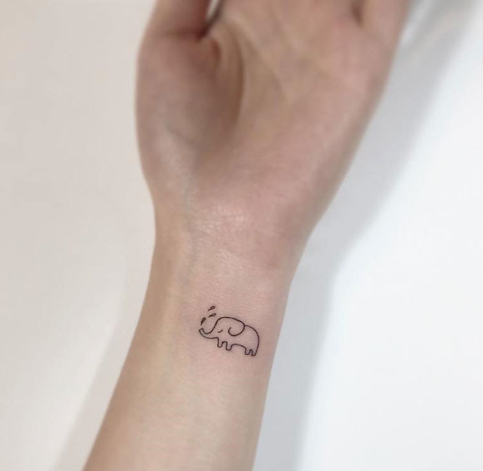 Unique Black Outline Small Elephant Tattoo On Wrist By A Korean