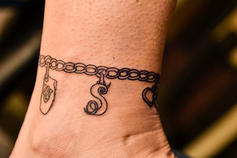 Unique Charm Bracelet Tattoo