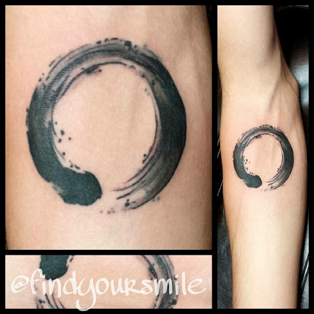 Watercolor Black Zen Circle Tattoo On Forearm