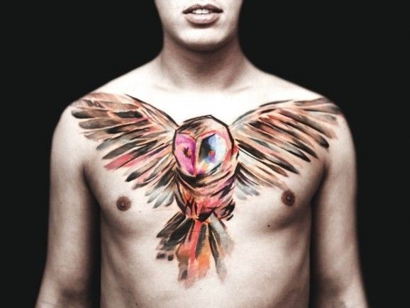 Watercolor Flying Owl Tattoo On Man Chest