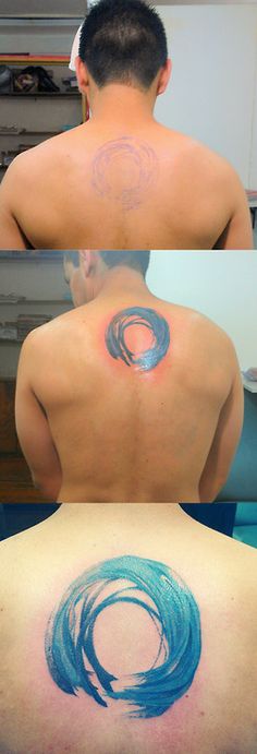 Watercolor Zen Circle Tattoo On Man Upper Back