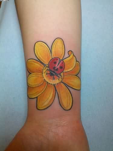 Yellow Daisy Flower Wrist Tattoo For Girls