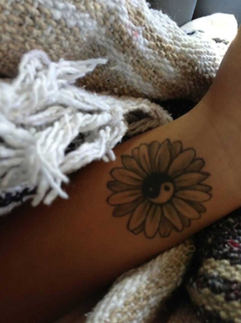 Yin Yang Daisy Flower Tattoo On Wrist