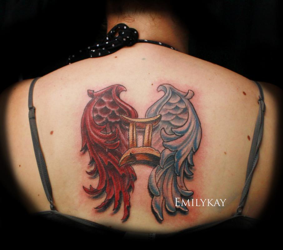 3D Gemini Zodiac Sign With Wings Tattoo On Upper Back By Emily Kay