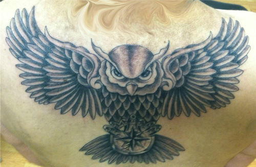 Amazing Black And Grey Flying Owl Tattoo On Upper Back