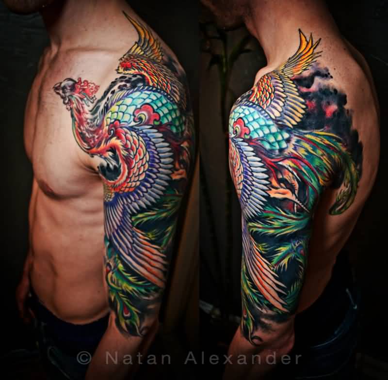 Amazing Colorful Phoenix Tattoo On Man Left Sleeve