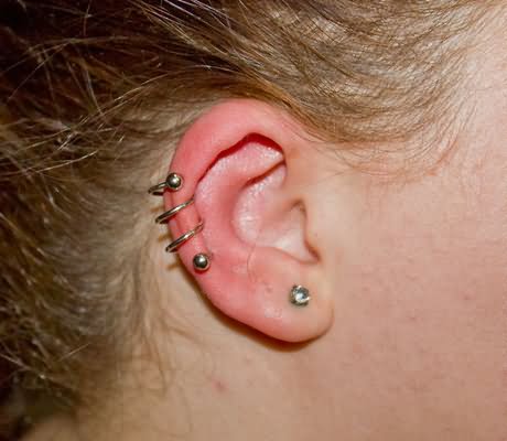 Amazing Ear Lobe And Spiral Helix Piercing
