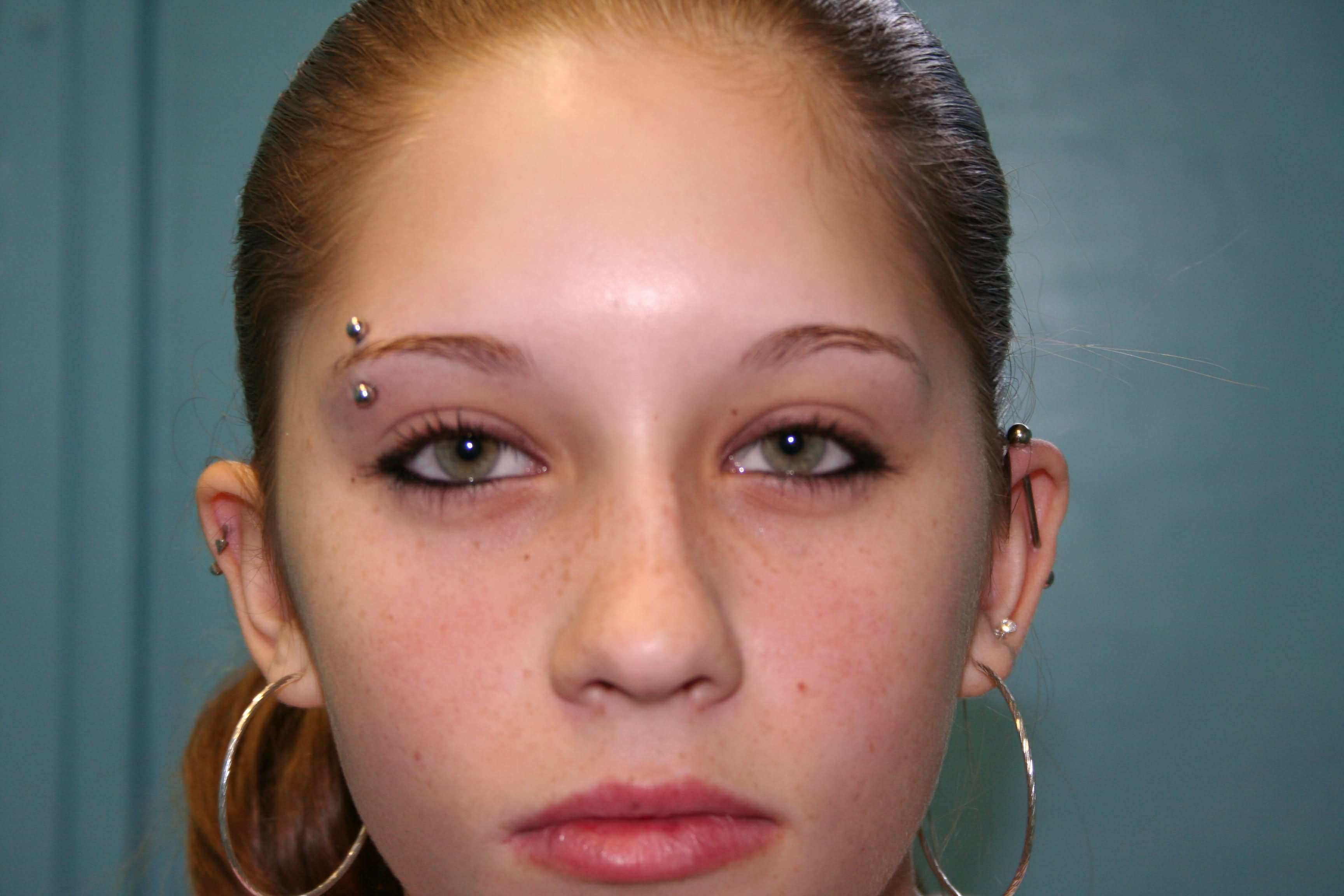 Amazing Silver Barbell Eyebrow Piercing