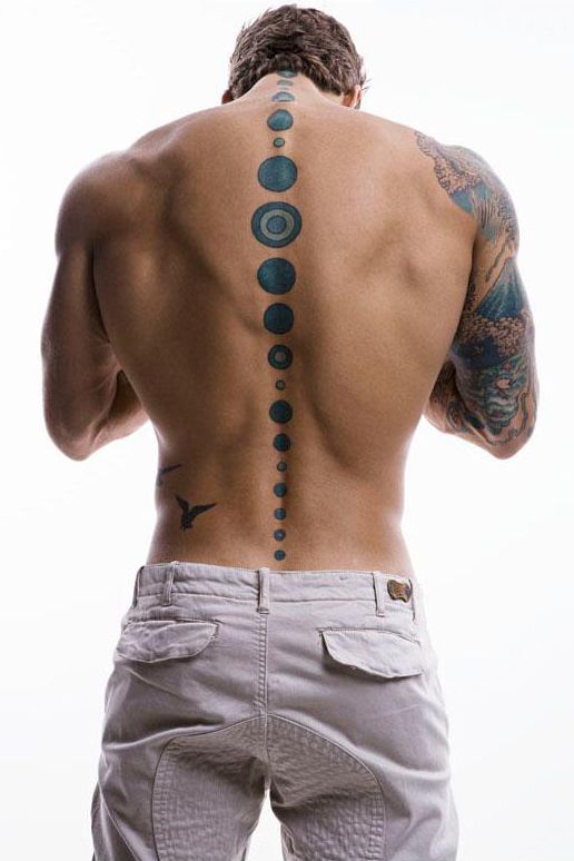 Attractive Black And Grey Phases Of The Moon Tattoo On Man Spine