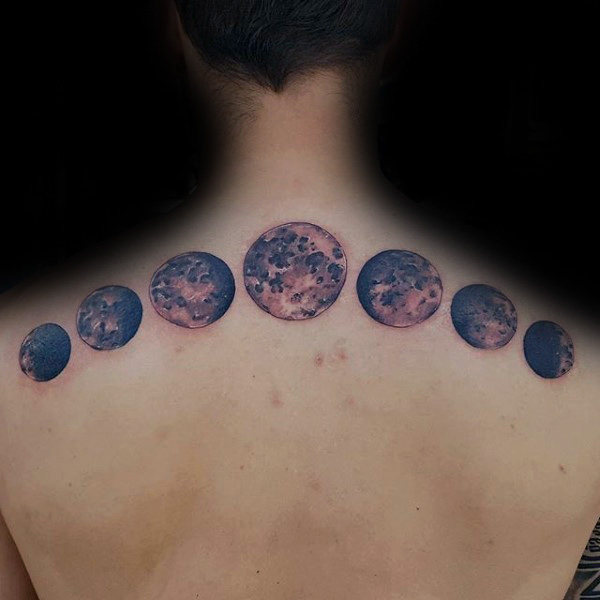Attractive Black Ink Phases Of The Moon Tattoo On Man Upper Back