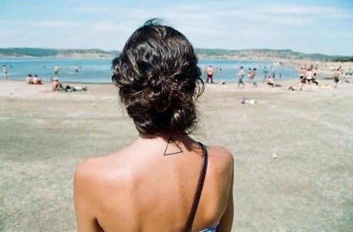 Attractive Black Outline Triangle Tattoo On Girl Back Neck