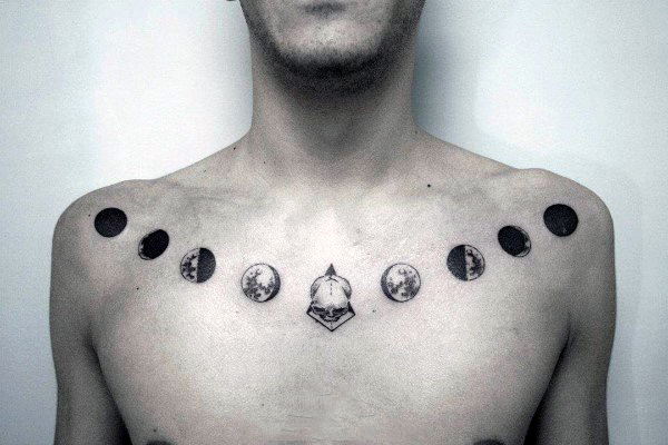 Attractive Black Phases Of The Moon Tattoo On Man Collarbone By Marla Moon