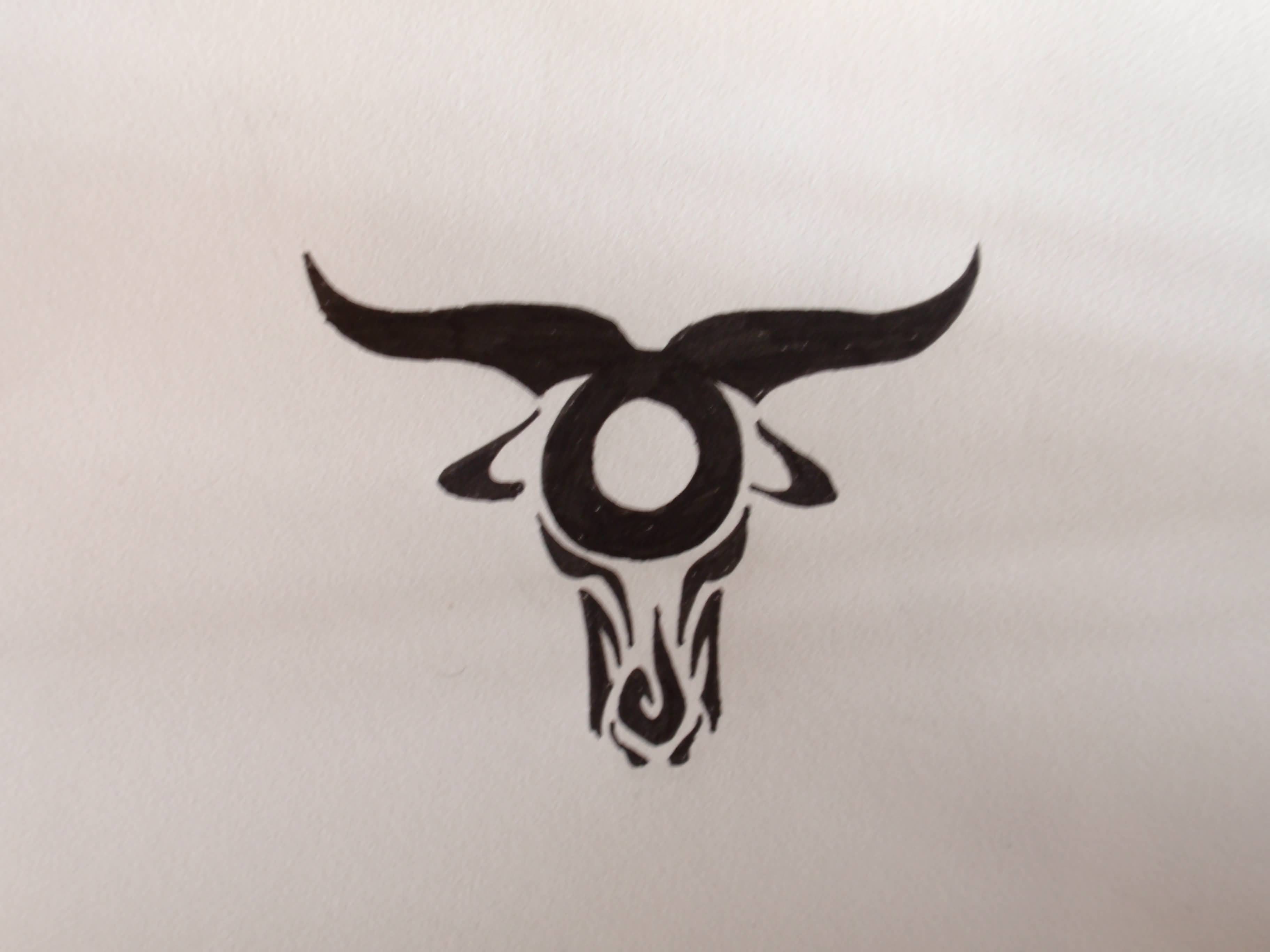 Attractive Black Tribal Zodiac Sign Tattoo Design