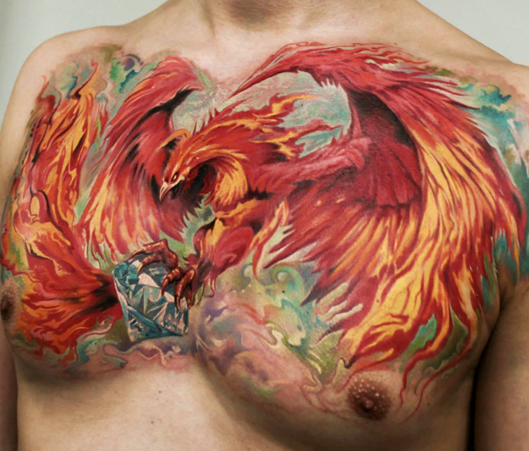 Attractive Colorful Flying Phoenix Tattoo On Man Chest By Led Coult