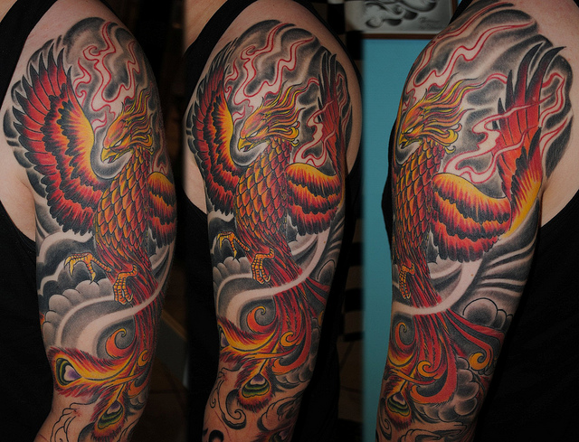 Attractive Colorful Phoenix Tattoo On Left Half Sleeve