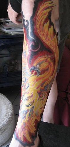 Attractive Colorful Phoenix Tattoo On Left Leg
