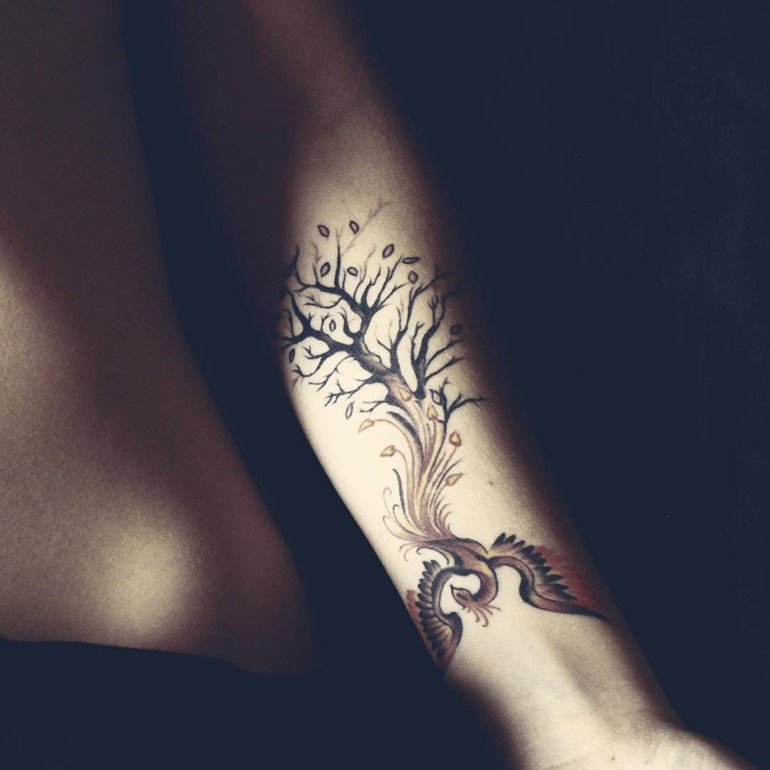 Attractive Cool Phoenix With Tree Tattoo On Forearm