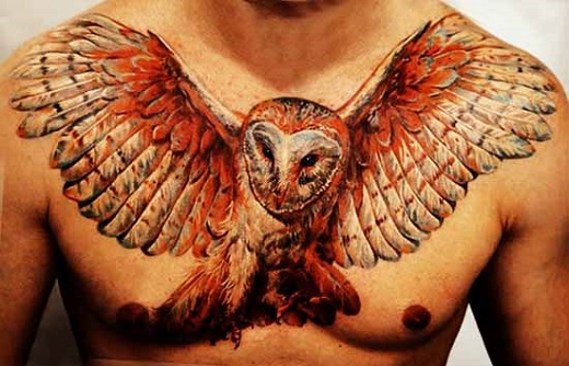 Attractive Flying Owl Bird Tattoo On Man Chest