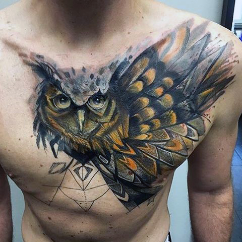 Attractive Flying Owl Tattoo On Man Chest