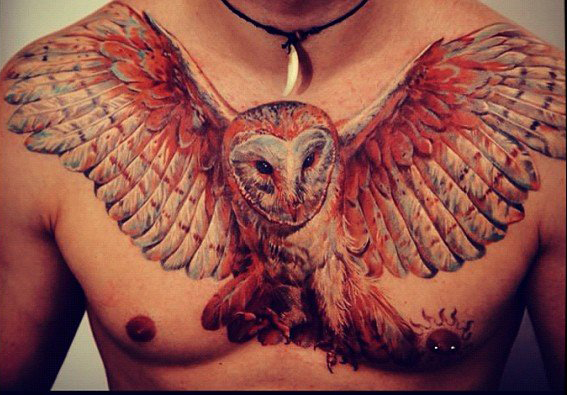 Attractive Flying Owl Tattoo On Man Chest