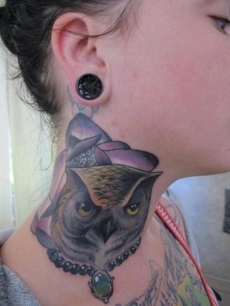 Attractive Owl Face With Flower Tattoo On Girl Right Side Neck