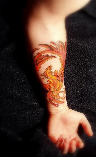 Attractive Phoenix Tattoo On Left Forearm