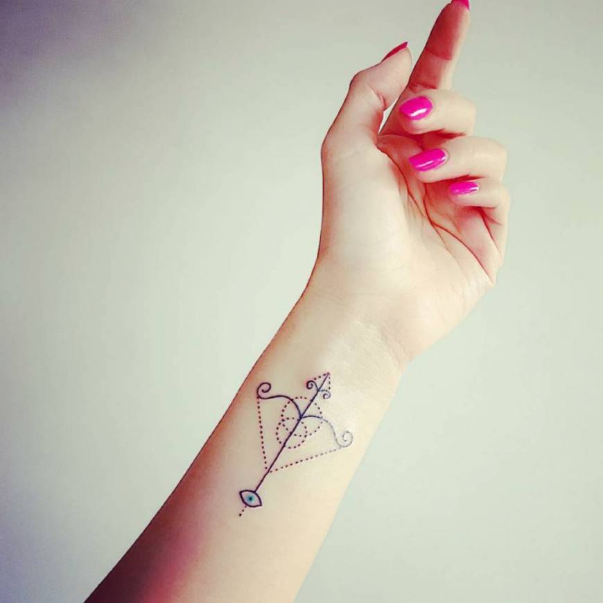 Attractive Sagittarius Zodiac Sign Tattoo On Girl Left Wrist