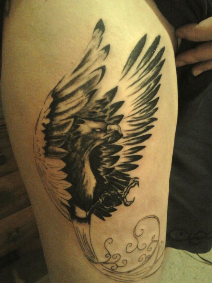 Awesome Black Ink Flying Phoenix Tattoo Design For Leg