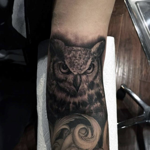 Awesome Black Ink Owl Tattoo On Man Right Forearm