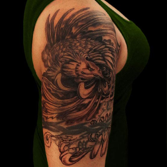 Awesome Black Ink Phoenix Tattoo On Man Right Half Sleeve