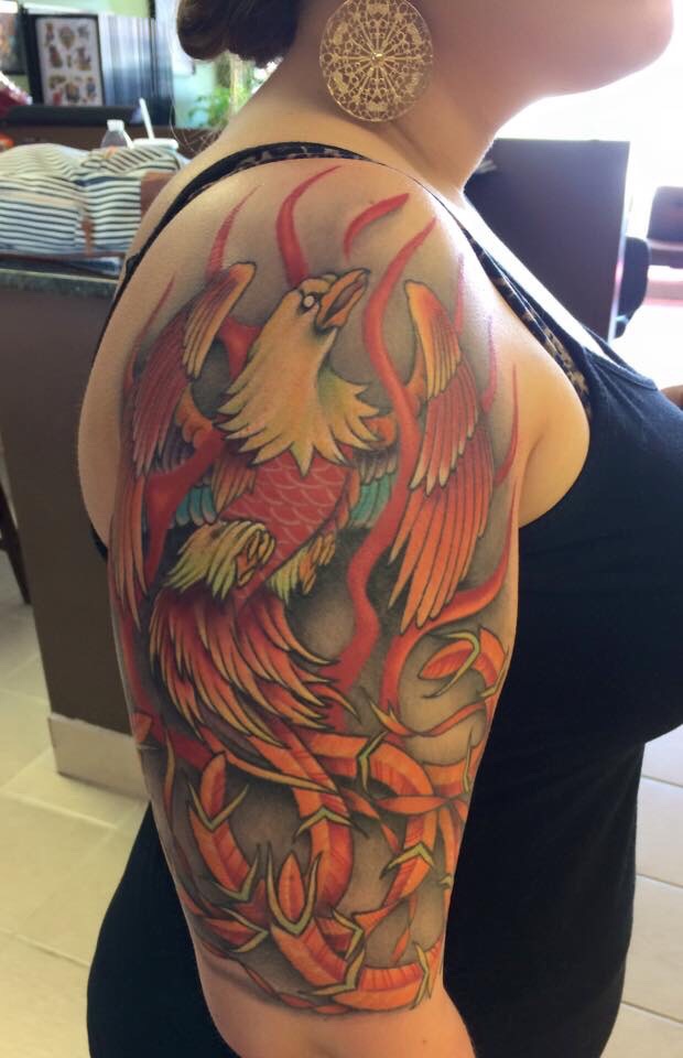 Awesome Colorful Phoenix Tattoo On Girl Right Half Sleeve